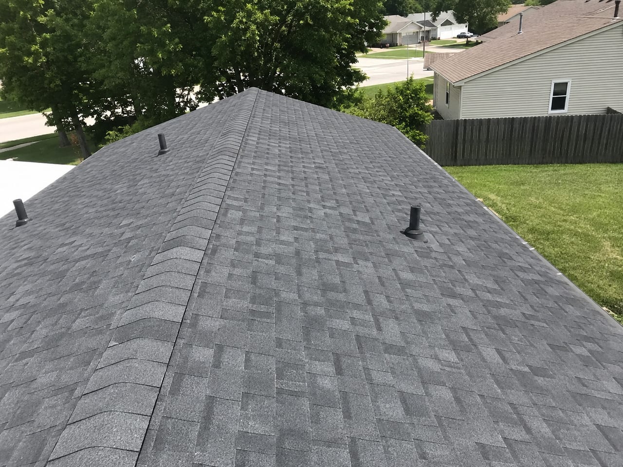 Gray shingle roof viewed from above on a residential property